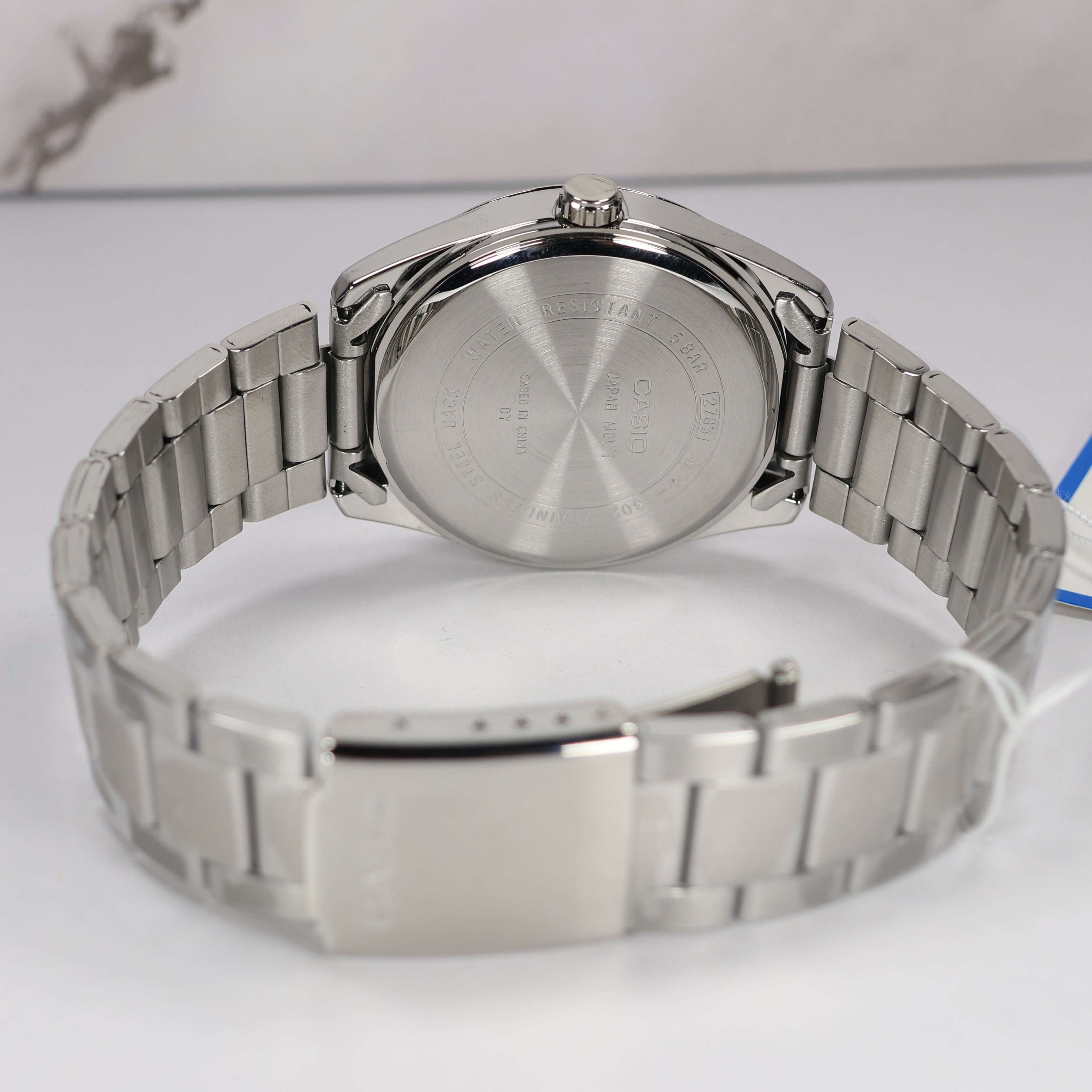 Casio Men's White Sunray Dial Stainless Steel Quartz Watch MTP-1302D-7A2