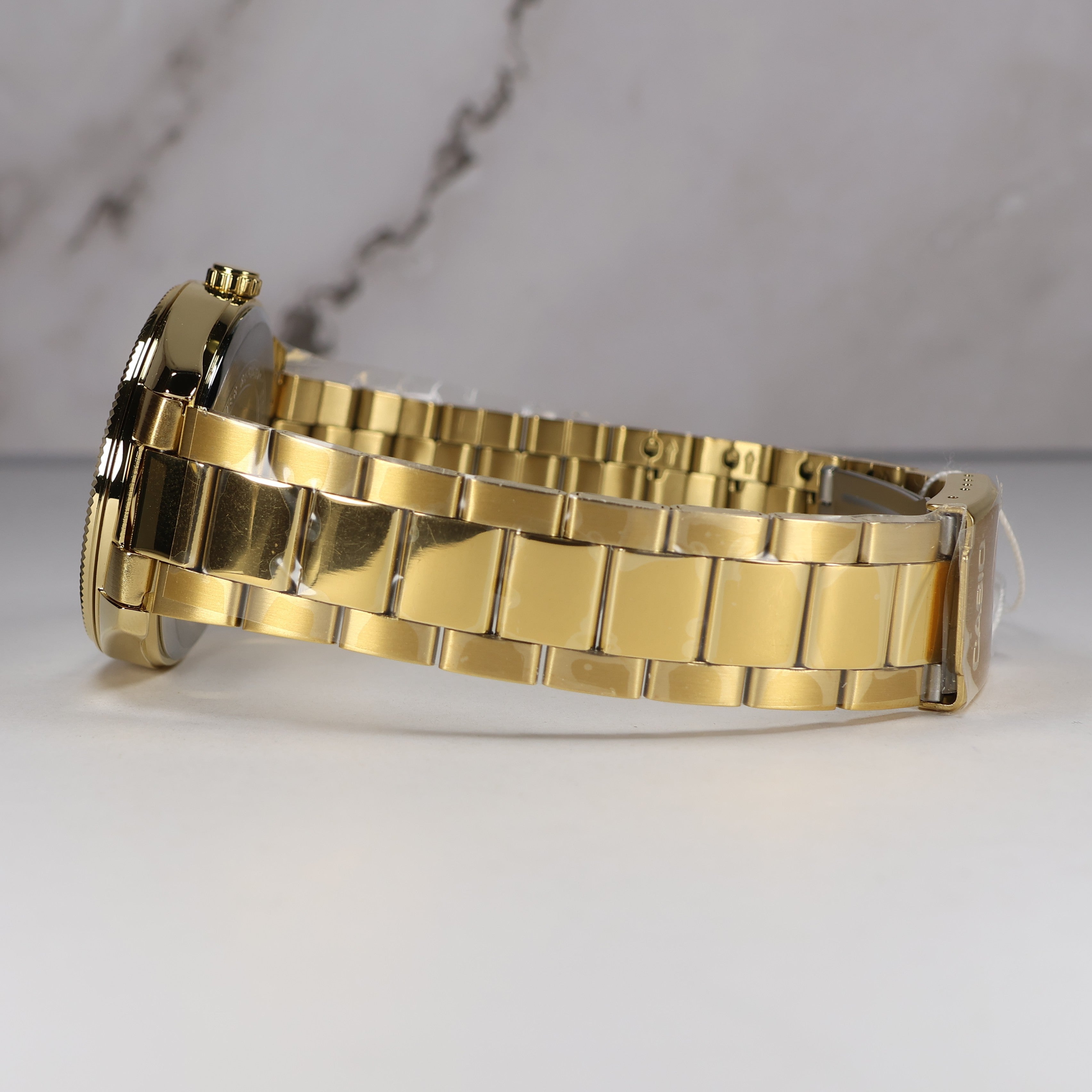 Casio Men's Green Dial Gold Band Stainless Steel Quartz Watch MTP-1302PGC-3AVEF