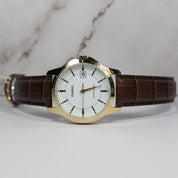 Casio Men's White Dial Brown Leather Quartz Watch MTP-V004GL-7A